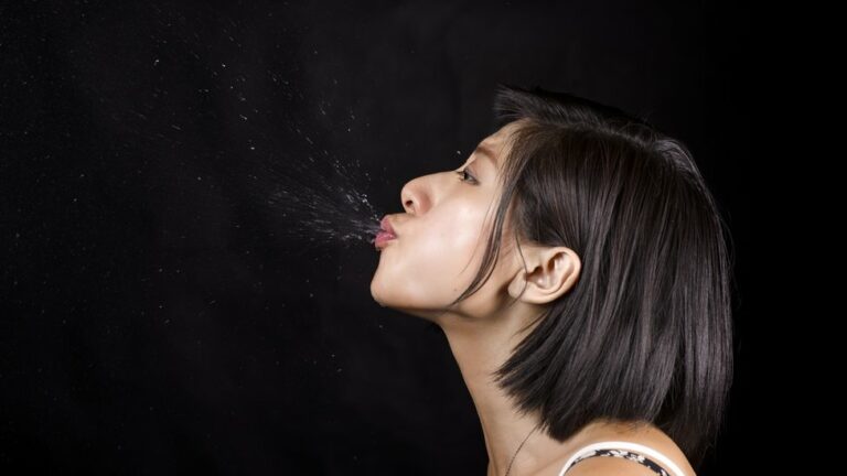 Spiritual Meaning of Spitting in Someone's Mouth